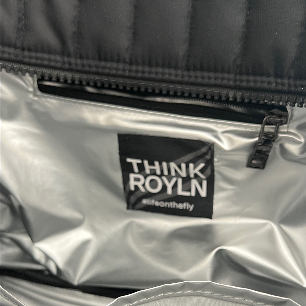 THINK ROYLN Silver Interior with Black Trim and Label